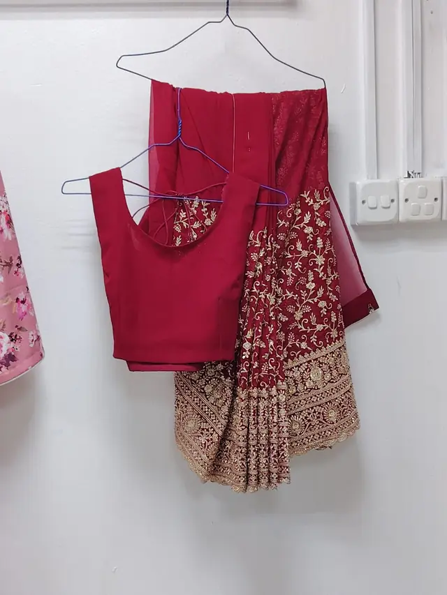 Red bridal lehenga with heavy embroidery